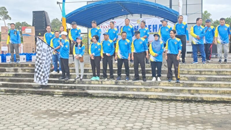 Berbaur Bersama Warga, Kapolres Gumas Ikut Semarakkan Jalan Sehat KNPI di Kuala Kurun