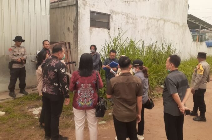 Polsek Pahandut Amankan Konstatering Perkara Perdata di Jalan G. Obos